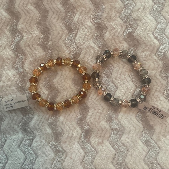 Jewelry - 2 NWT crystal bead bracelets. One is amber colored other is ink gray and clear